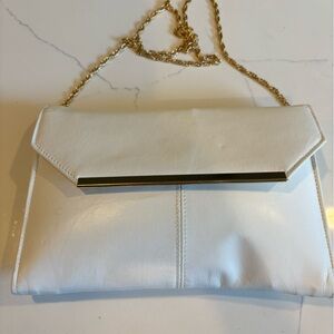 Elegant White Clutch with Gold Chain